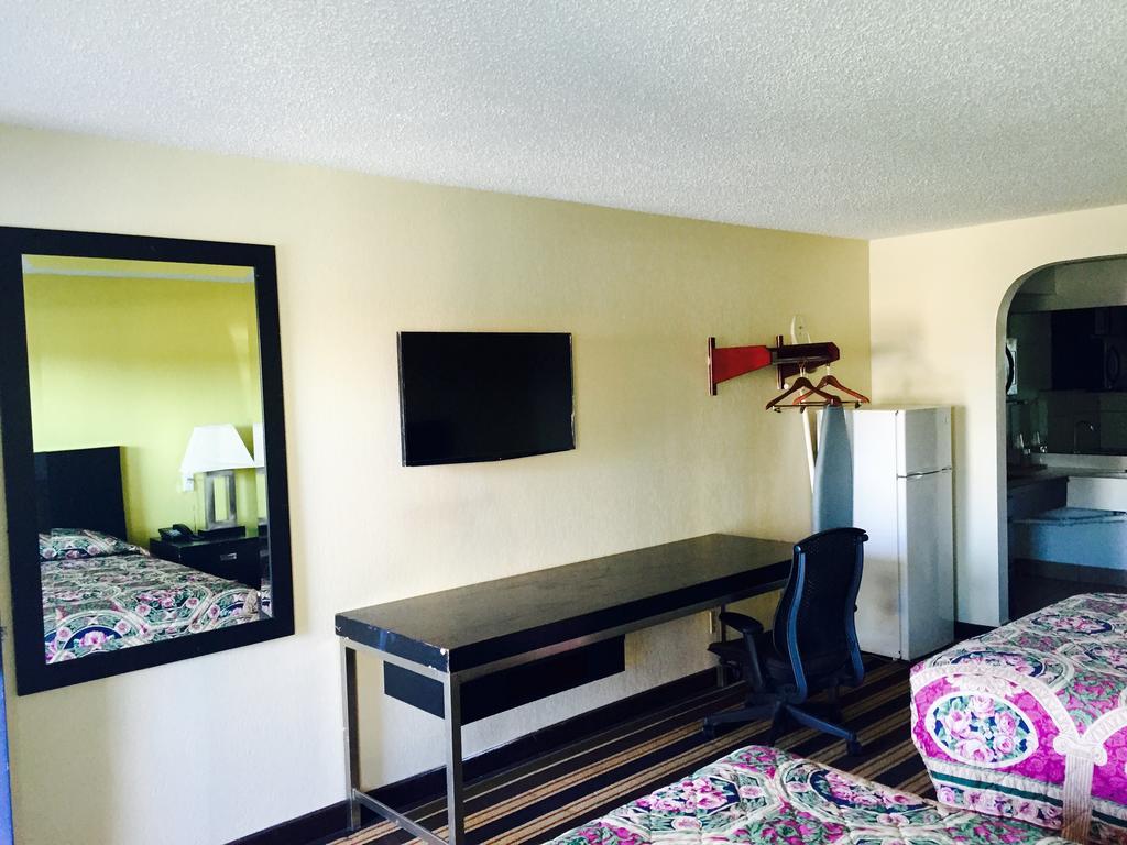 Executive Inn Groves Kamer foto