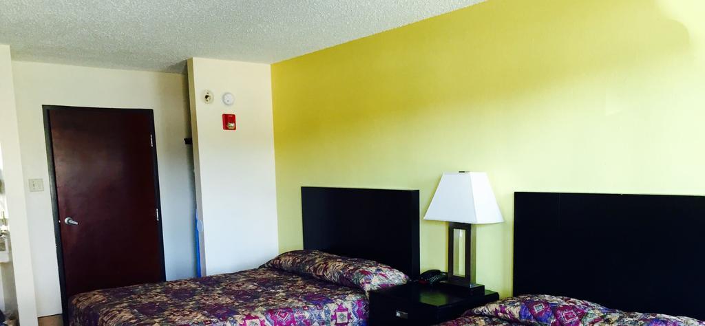 Executive Inn Groves Kamer foto