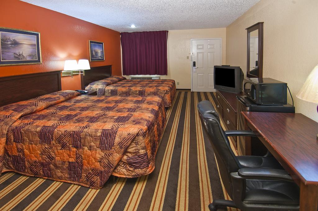 Executive Inn Groves Kamer foto