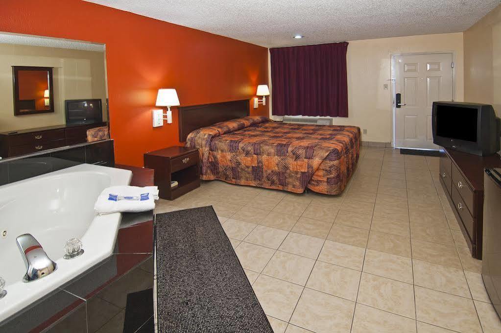 Executive Inn Groves Buitenkant foto
